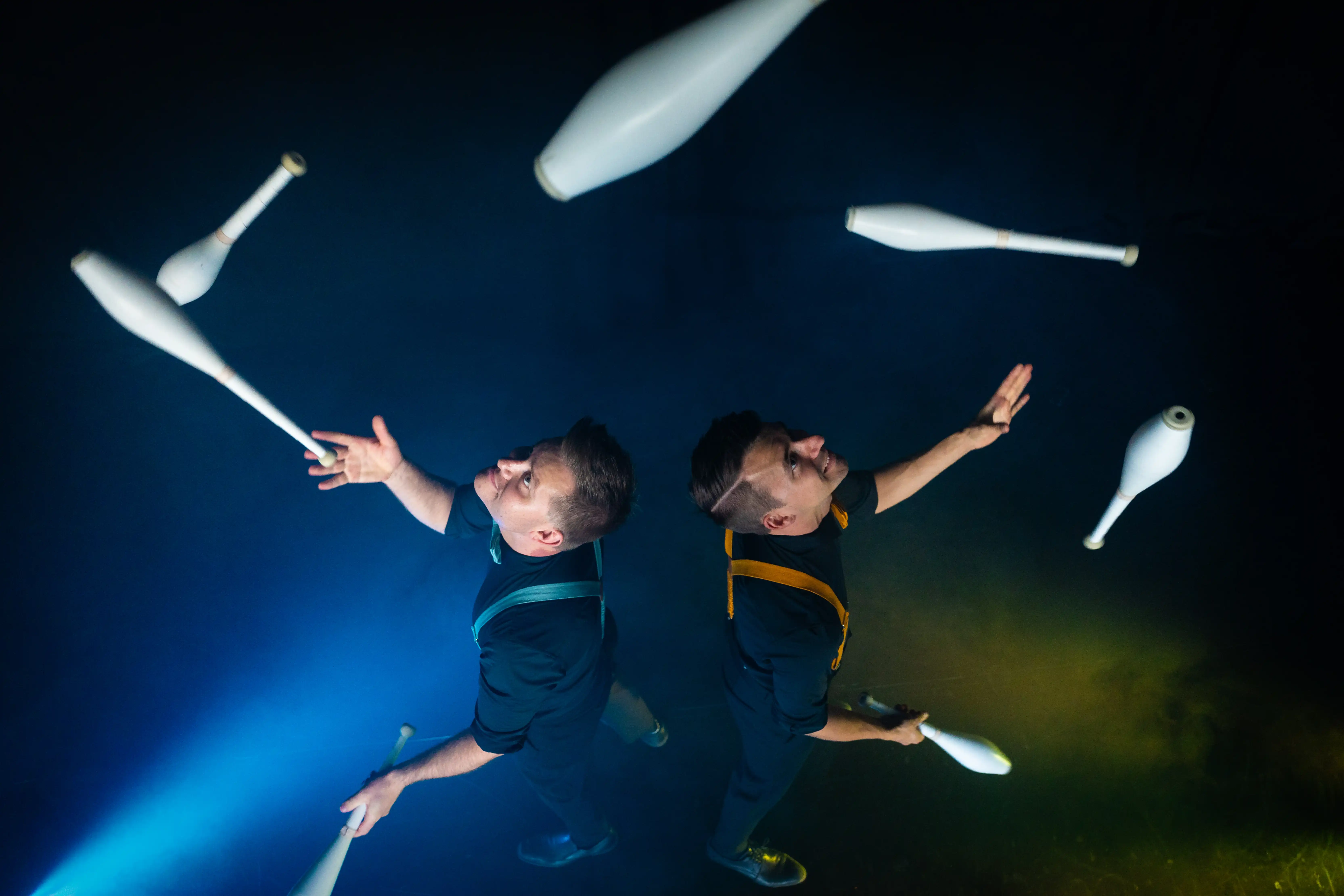 Daniel and Julius passing side to side on stage